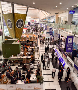 people moving in ADIPEC exhibition Halls